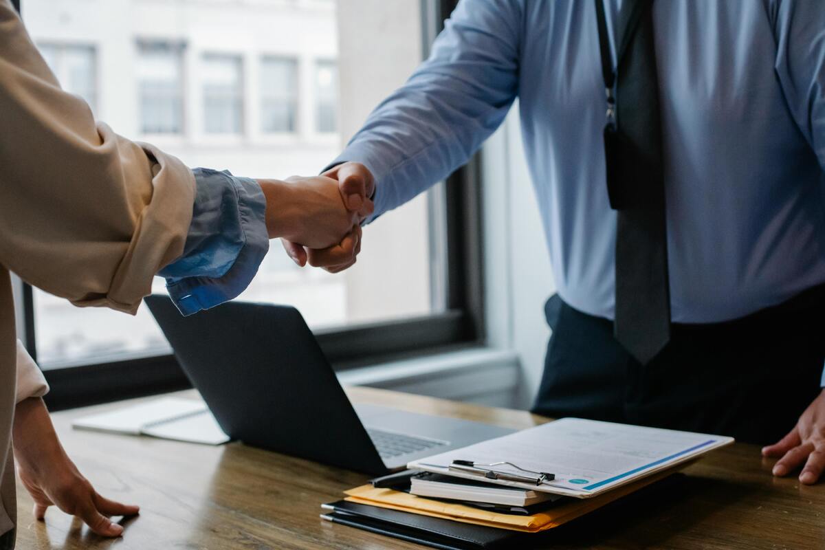 Two people shaking hands